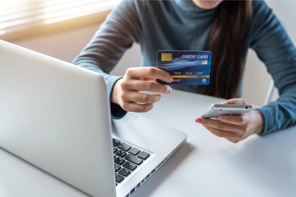 shopping online with credit card and laptop